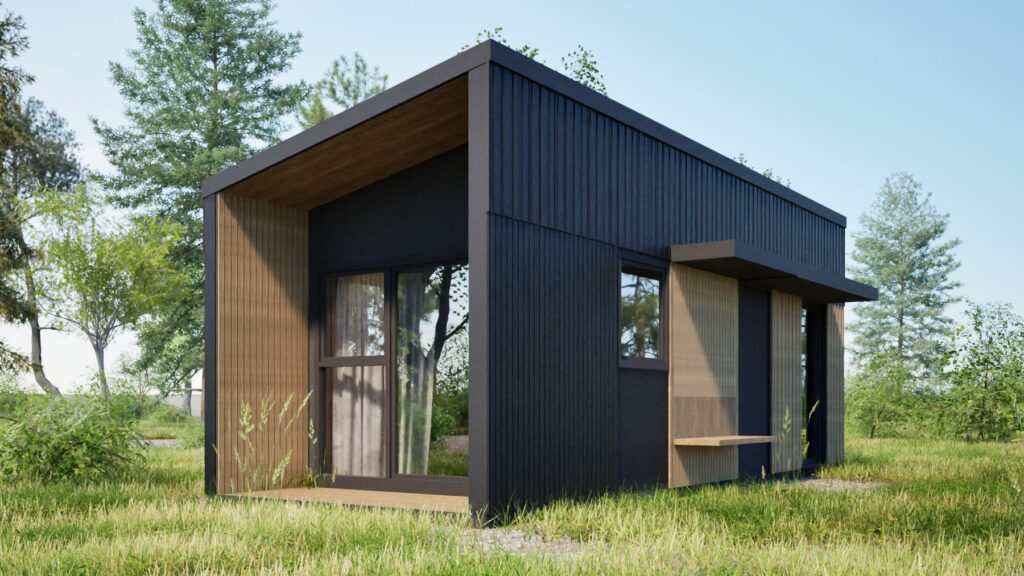Nowoczesny domek modułowy z dużymi oknami, idealny jako domek mobilny lub dom mobilny. Stylowa architektura oraz funkcjonalne rozwiązania sprawiają, że to doskonały wybór dla osób poszukujących komfortowych domów modułowych w otoczeniu natury.